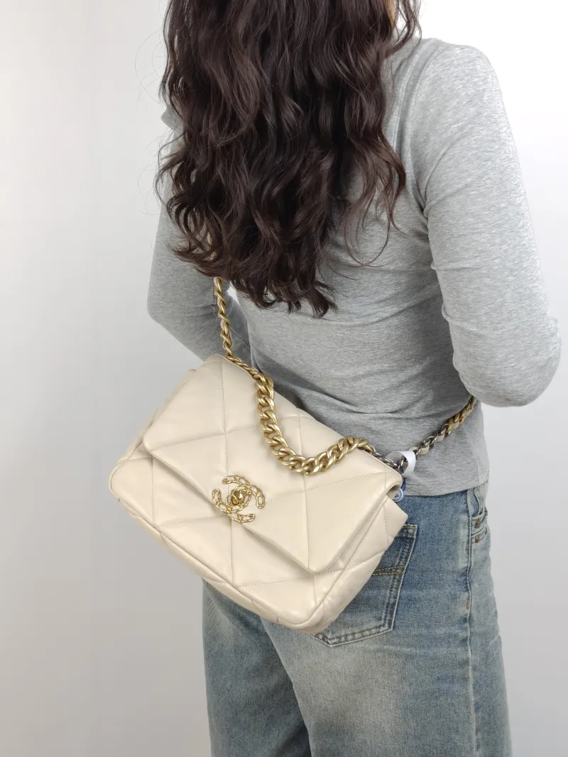 Chanel Crossbody Bag 19Bag Beige Lambskin Small 26 × 9 × 16 cm 30 — on-model view 1 of 3
