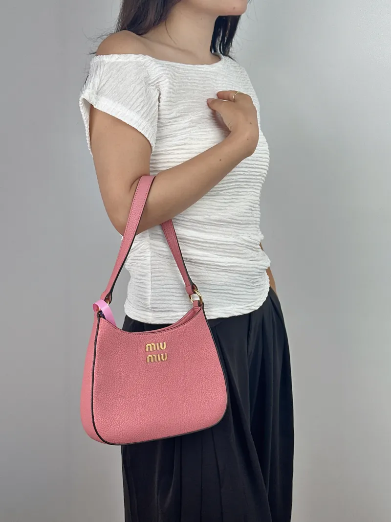 Miumiu Shoulder Bag Pink Calfskin One Size 22.5 × 5 × 18 cm — on-model view 1 of 2