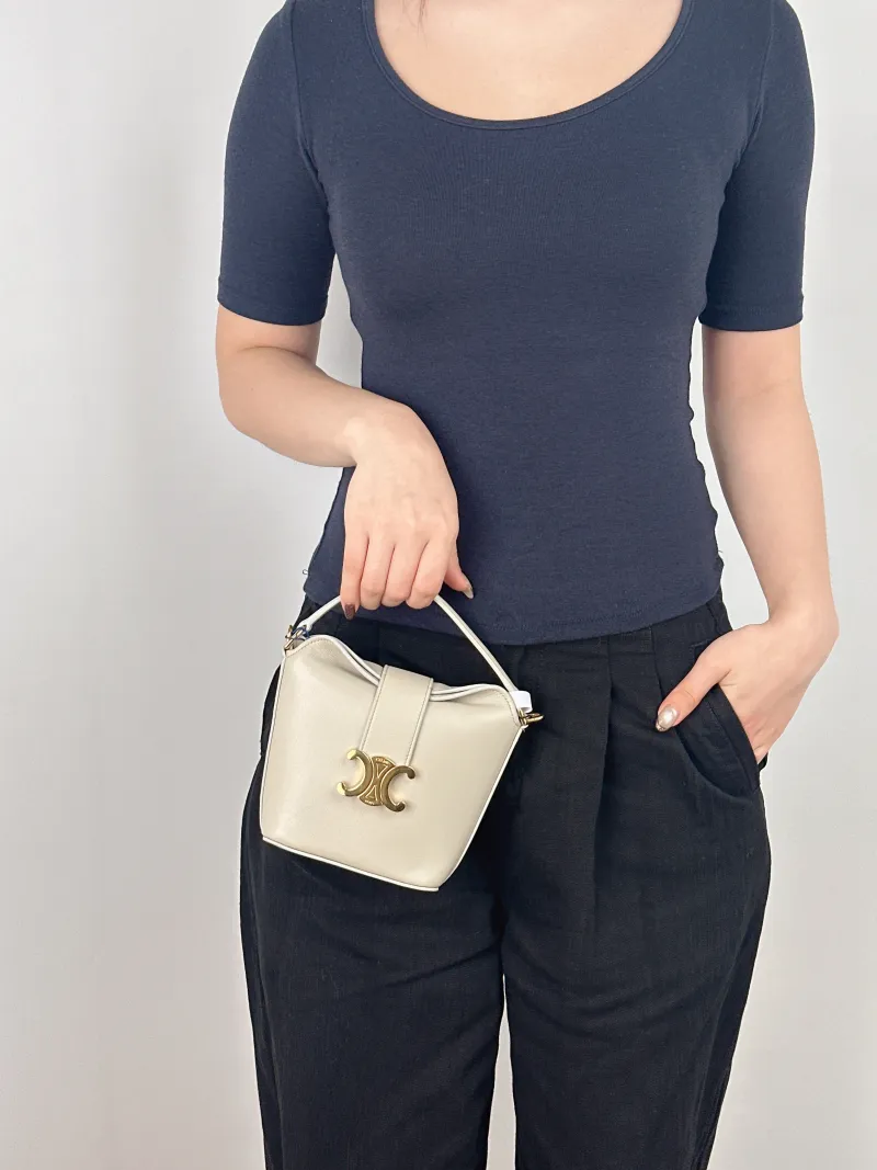 CELINE Crossbody Bag Louise Bucket Bag White Calfskin Mini 13.5 × 10 × 16 cm — on-model view 2 of 2