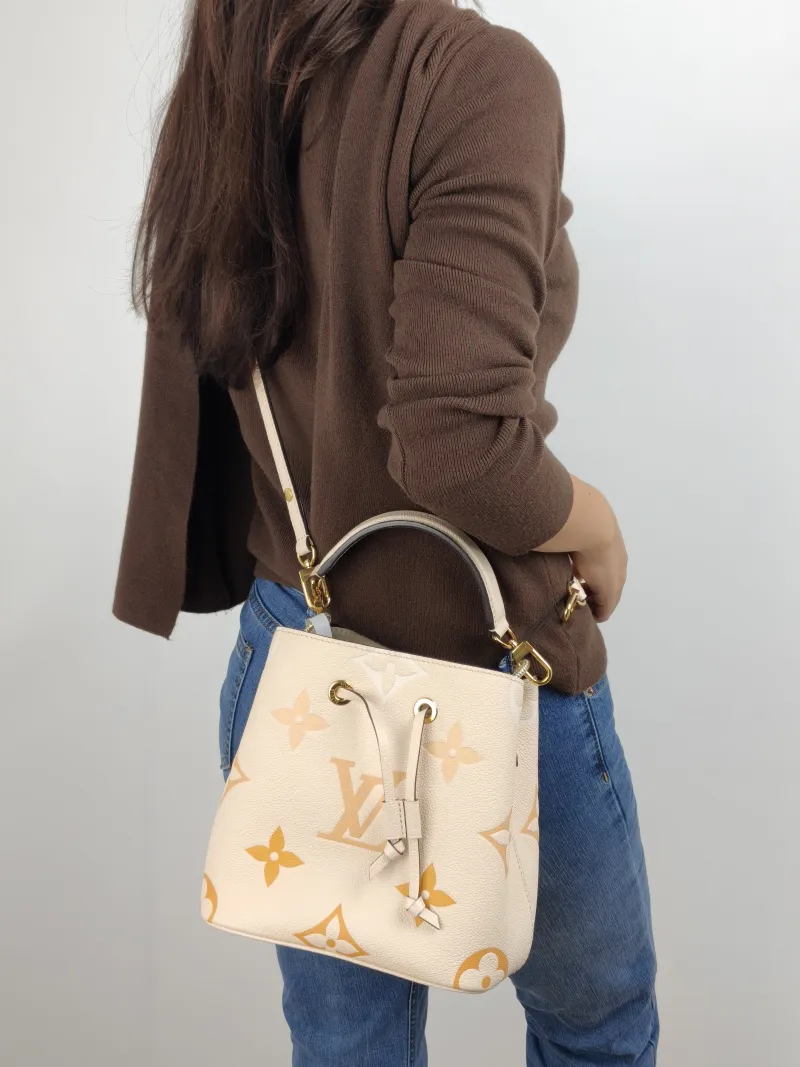 Louis Vuitton Crossbody Bag NÉONOÉ Bucket Bag BB Monogram Empreinte Embossed Calfskin BB 20 × 13 × 20 cm — on-model view 1 of 2