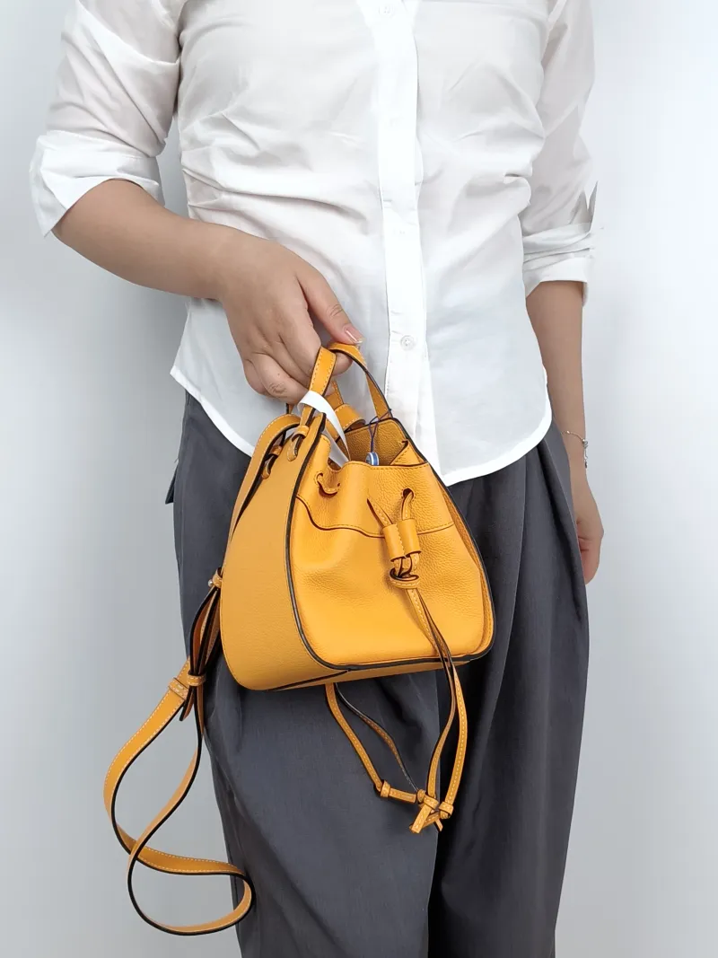 LOEWE Crossbody Bag Hammock Calfskinmini17 × 11 × 19.5 cm — on-model view 2 of 3