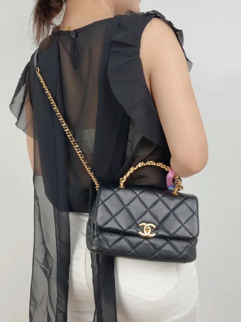 Chanel Crossbody Bag24b Black Lambskin One Size21 × 5 × 15 cm — on-model view 1 of 3