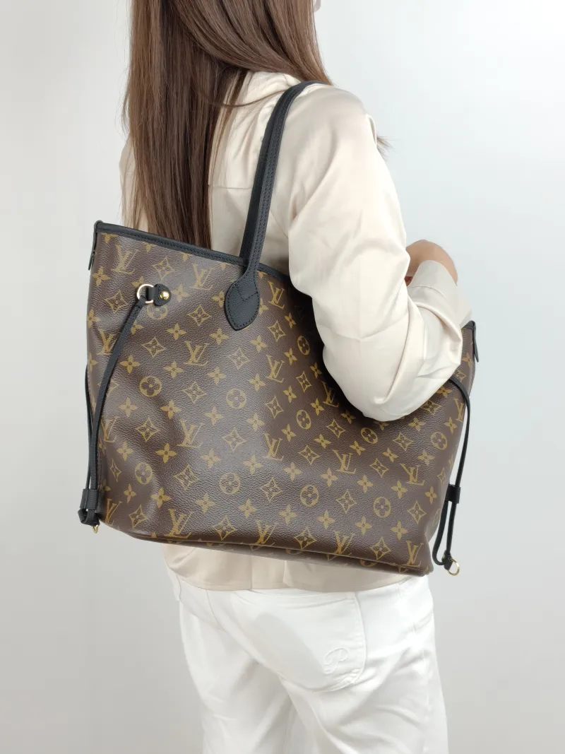 Louis Vuitton Shoulder Bag NEVERFULL INSIDE OUT Black PVC · Calfskin Medium 31 × 14 × 28 cm — on-model view 2 of 2