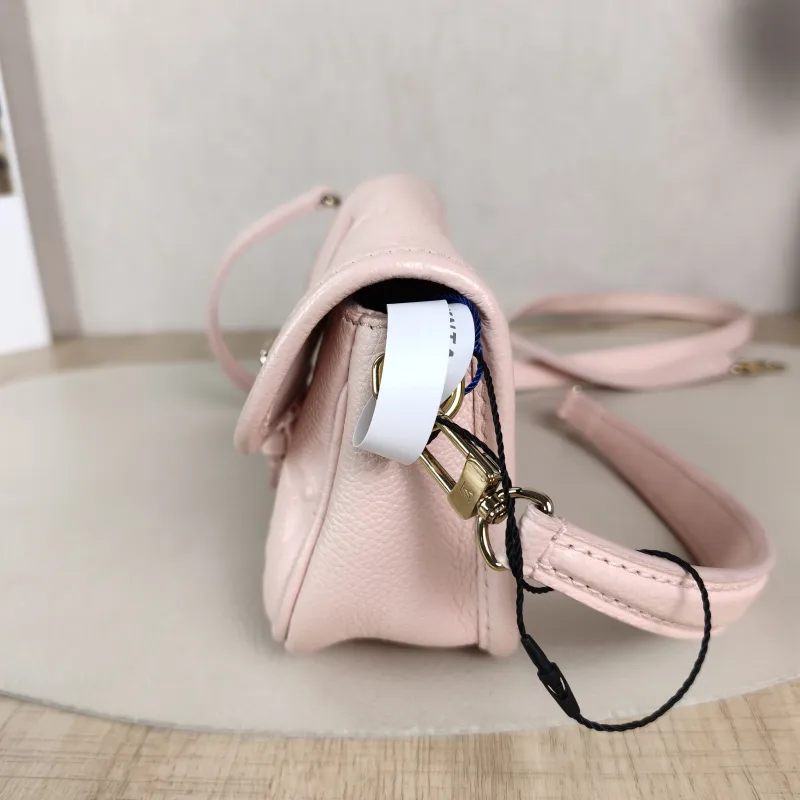 Louis Vuitton Crossbody Bag Diane Baguette Bag Empreinte Embossed Calfskin Monogramnano19 × 6 × 10.5 cm — detail view 6 of 11