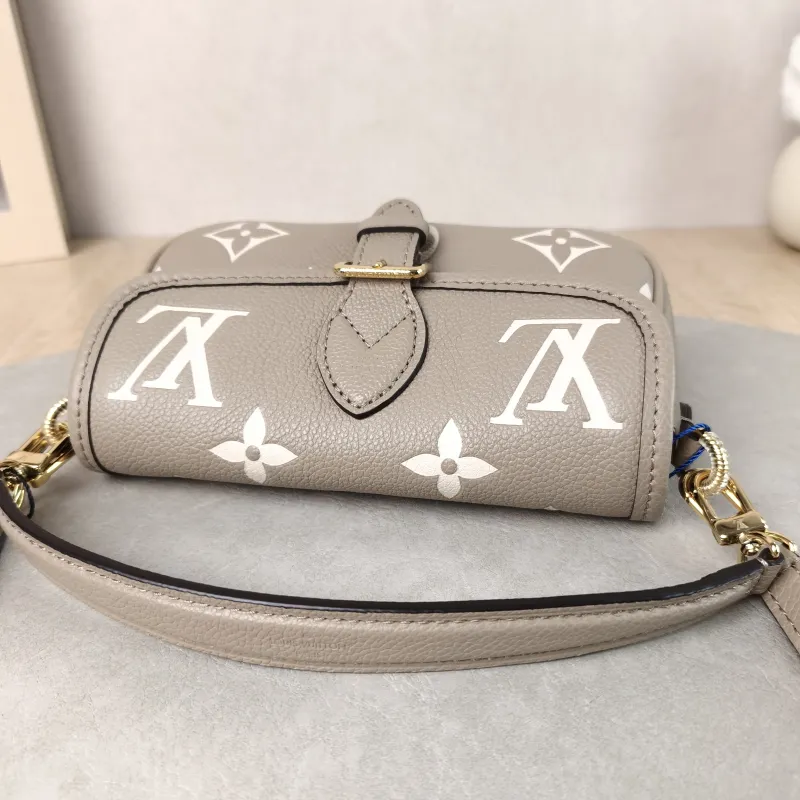 Louis Vuitton Crossbody Bag Diane Baguette Bag Empreinte Embossed Calfskin nano 19 × 6 × 10.5 cm — detail view 2 of 14