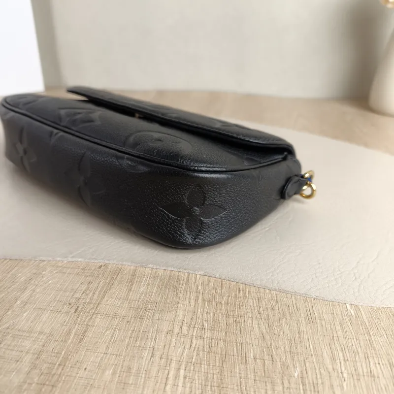 Louis Vuitton Crossbody Bag IVY Black Empreinte Embossed Calfskin Small 23.5 × 4.3 × 12 cm — detail view 9 of 12