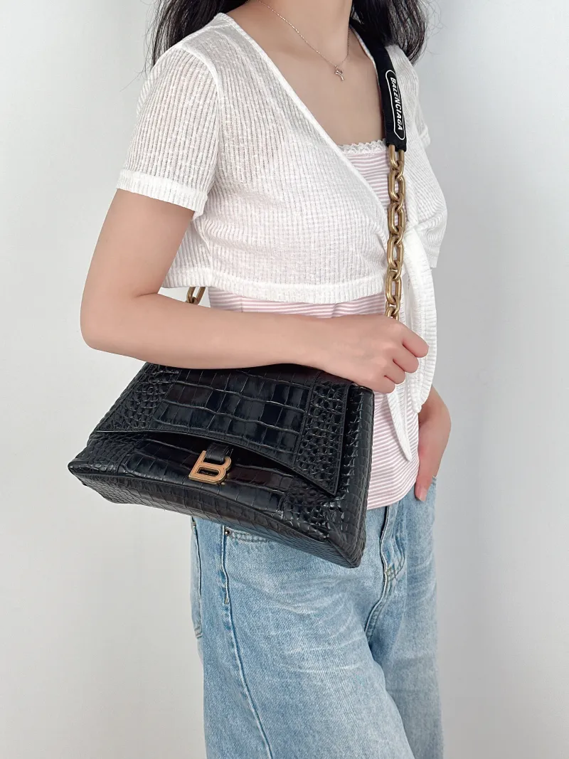 BALENCIAGA Shoulder Bag DOWNTOWN Black Calfskin Small30 × 10 × 17.5 cm — on-model view 3 of 3