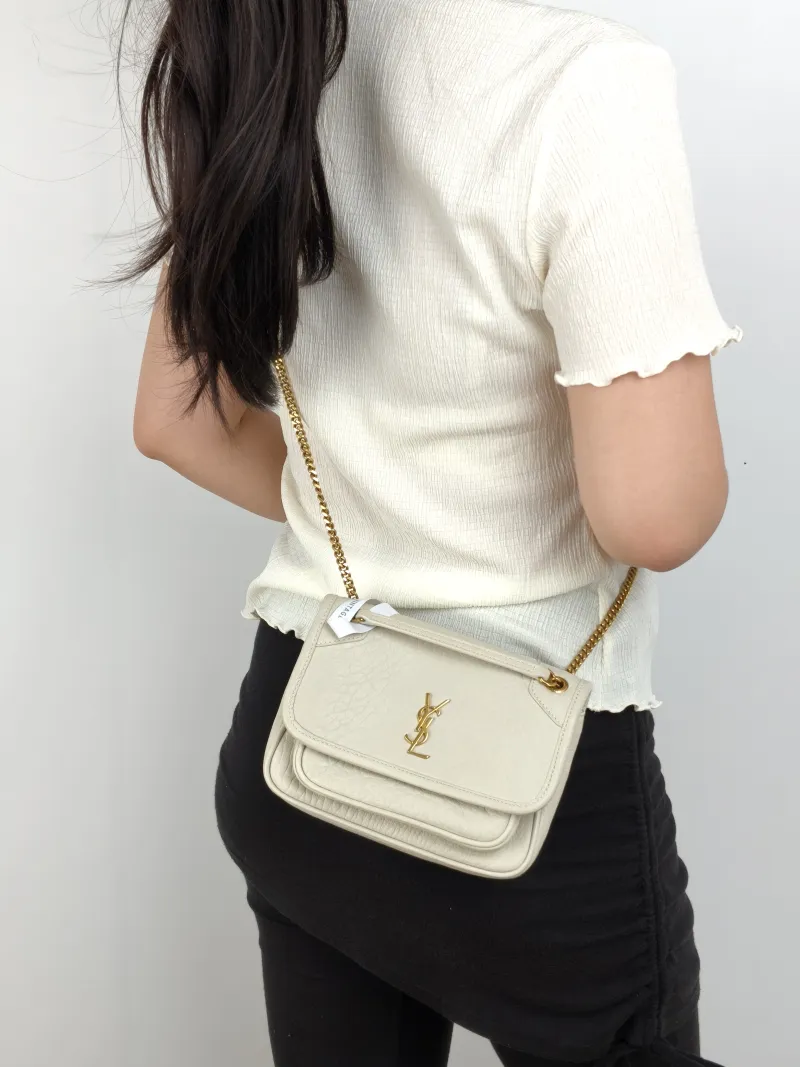 SAINT LAURENT Crossbody Bag Niki White Lambskin Mini 18 × 5 × 12.5 cm — on-model view 3 of 3