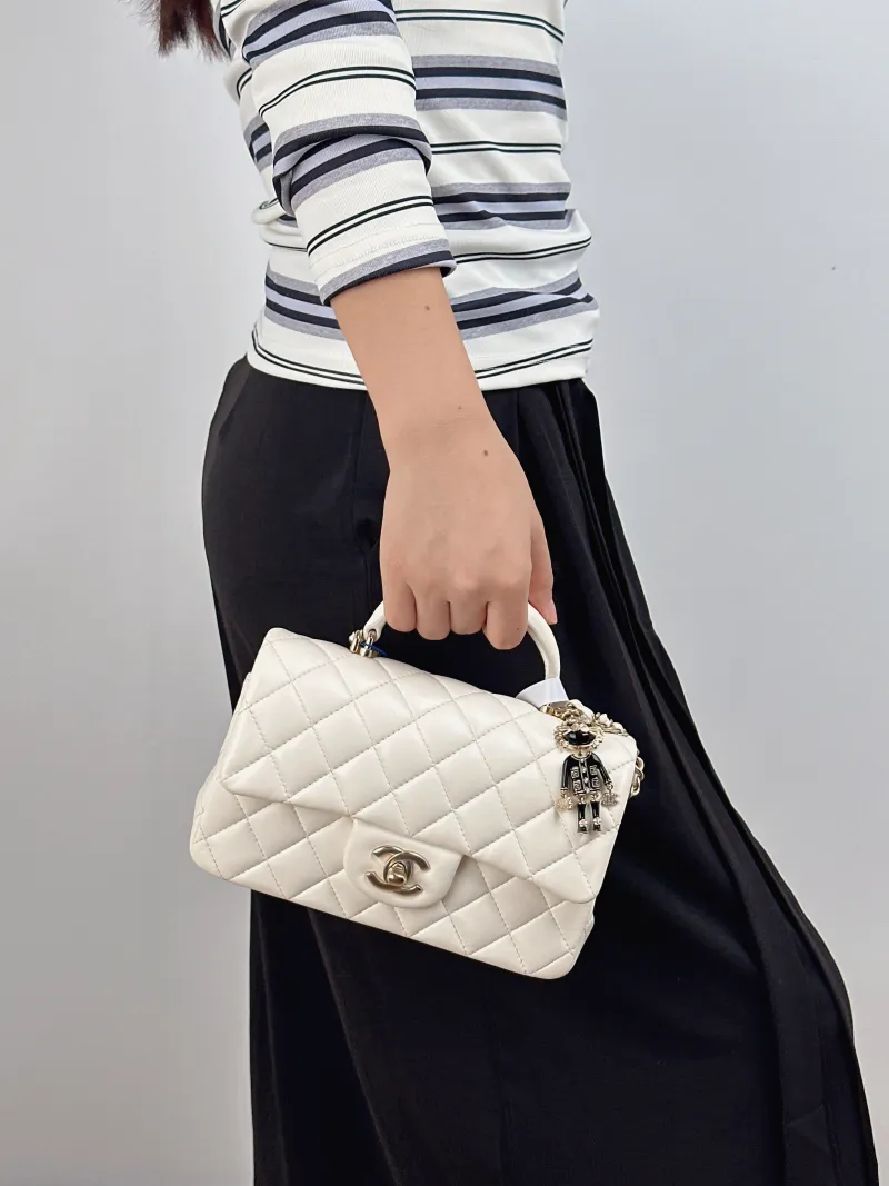 Chanel Crossbody Bag mini White Lambskin mini 20 × 6 × 12 cm — on-model view 2 of 2
