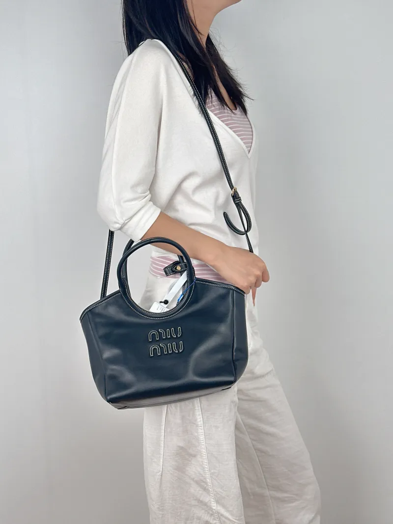 Miumiu Shoulder Bag IVY Tote Shopping Tote Black CC alfskin Small22 × 12 × 23.5 cm — on-model view 1 of 3
