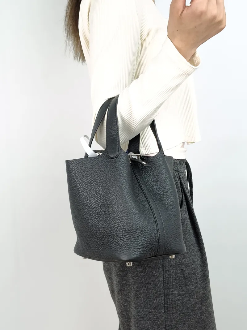 Hermès Top Handle Bag Picotin Lock 18 1889Black Clemence Taurillon TC Calfskin Small18 × 13 × 19 cm — on-model view 1 of 5