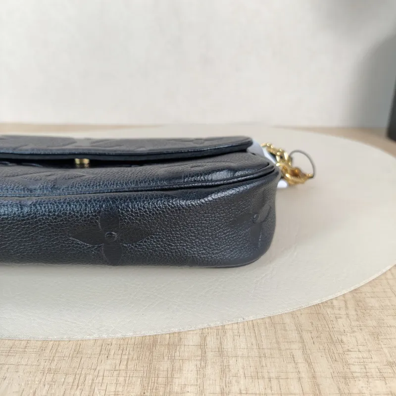 Louis Vuitton Crossbody Bag IVY Black Empreinte Embossed Calfskin Small23.5 × 4.3 × 12 cm — detail view 1 of 12