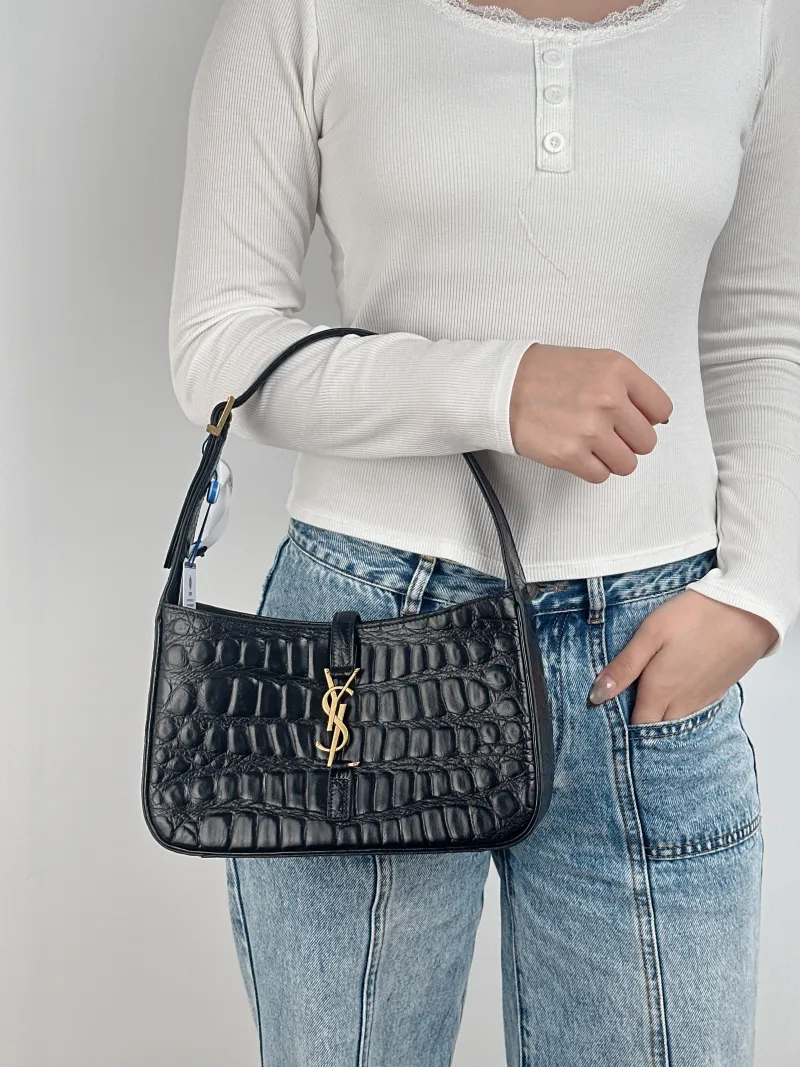 SAINT LAURENT Shoulder Bag LE 5 À 7 Black Calfskin Small 23 × 6.5 × 16 cm — on-model view 1 of 2