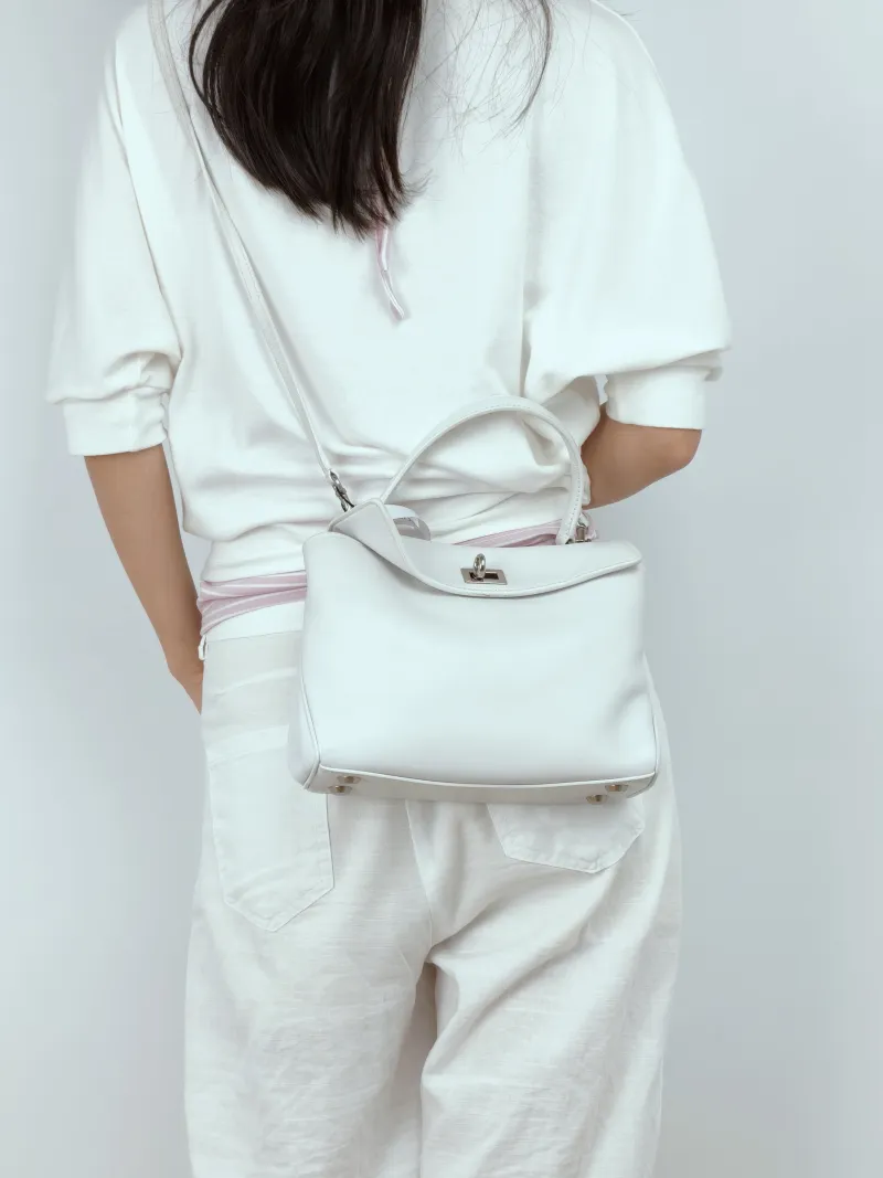 BALENCIAGA Crossbody Bag RODEO White Calfskinmini23 × 10 × 17 cm — on-model view 1 of 3