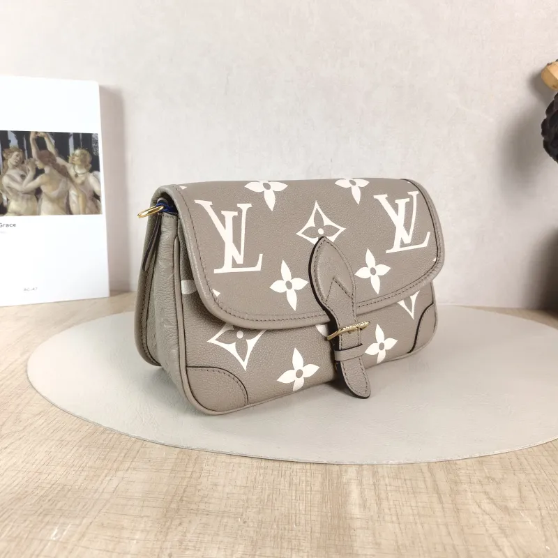 Louis Vuitton Crossbody Bag Diane Baguette Bag Monogram Empreinte Embossed Calfskin Small 24 × 9 × 15 cm — cover view 2 of 5