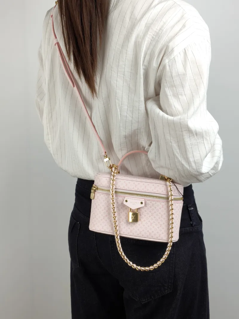 Louis Vuitton Shoulder Bag VANITY POUCH Cosmetic Bag Pink Calfskin One Size 19 × 6.5 × 11.5 cm — on-model view 3 of 3