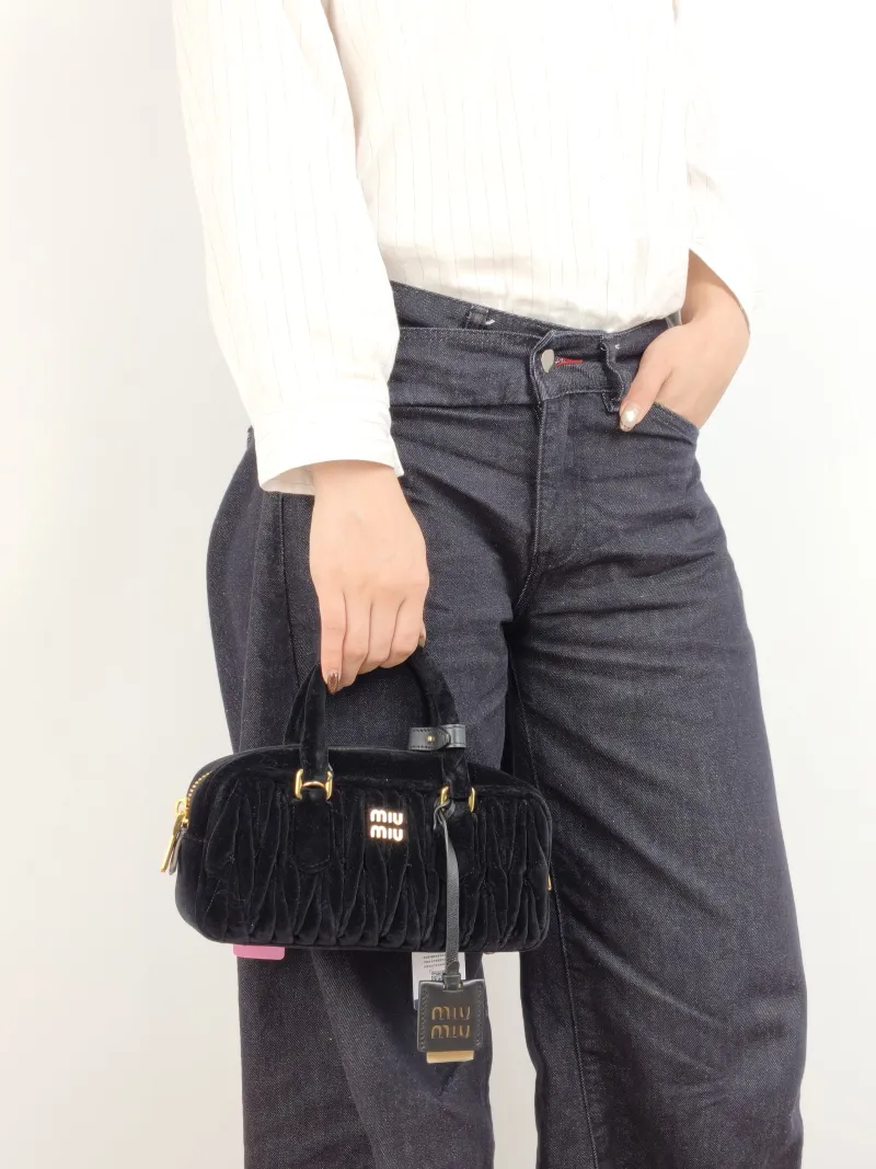 Miumiu Top Handle Bag Arcadie MatelasséCollection Edition Black Velvet Medium 23 × 7.5 × 11 cm — on-model view 2 of 2