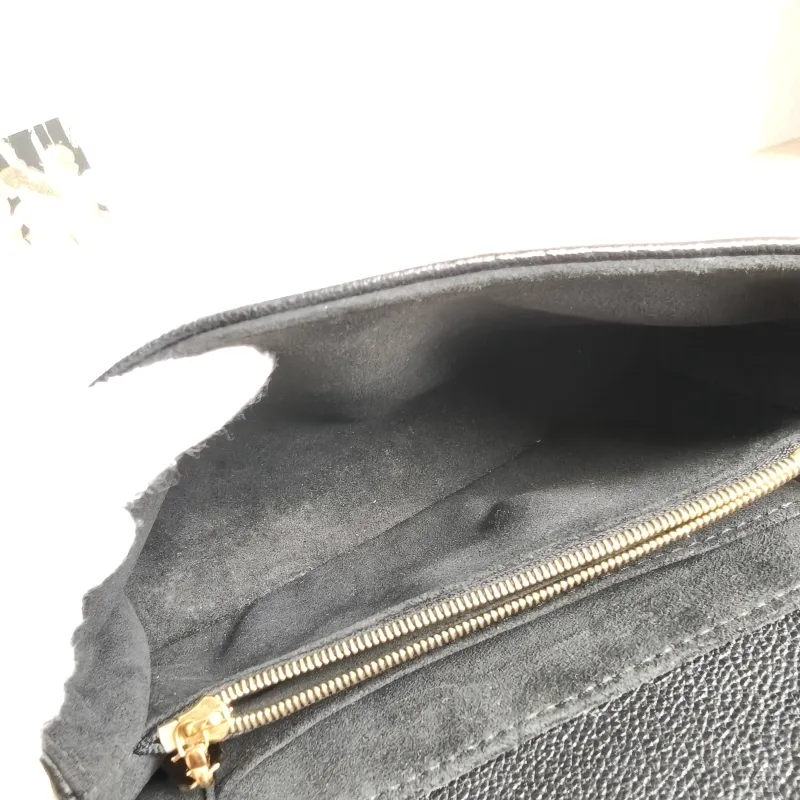 Louis Vuitton Crossbody Bag MADELEINE Black Empreinte Embossed Calfskin BB 24 × 8.5 × 17 cm — detail view 15 of 15