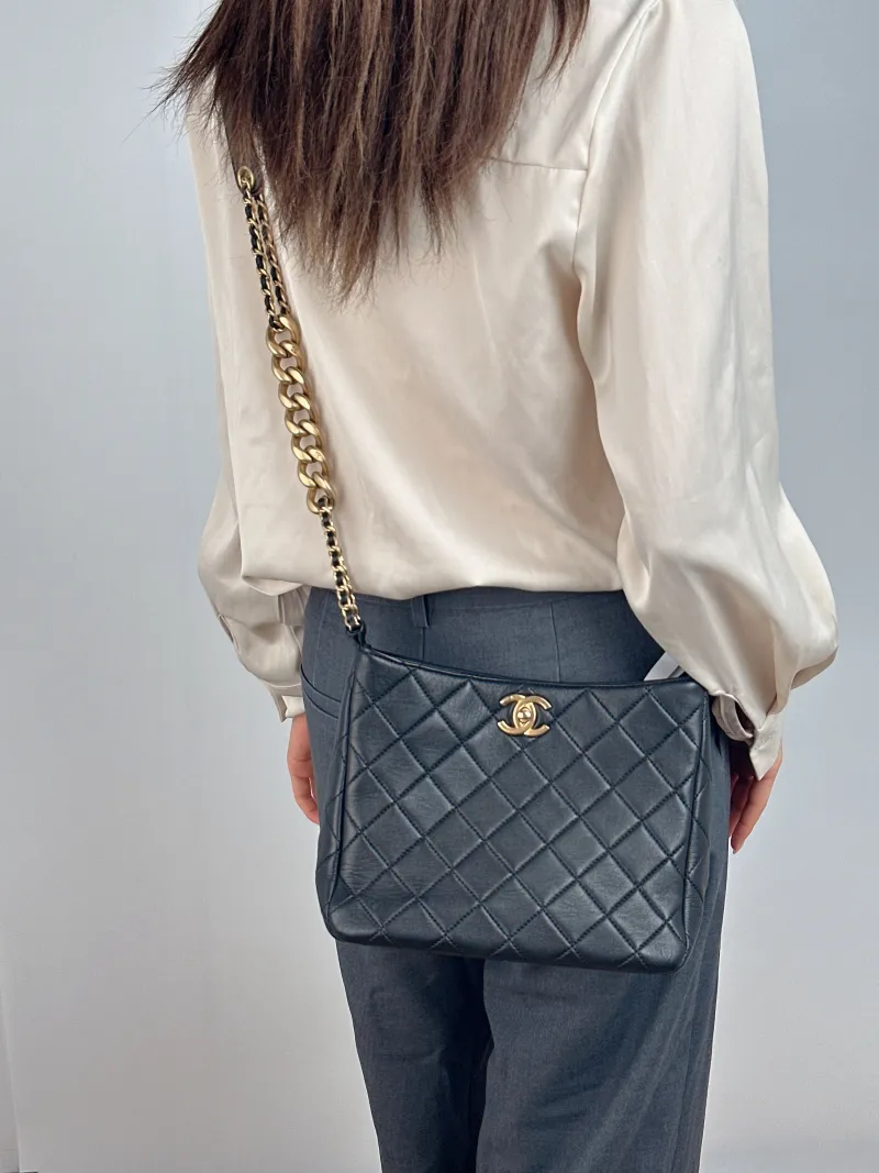 Chanel Shoulder Bag hobo Black with Gold-Tone Hardware Lambskin One Size 22 × 9 × 19 cm — on-model view 1 of 2