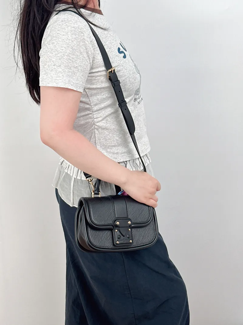 Louis Vuitton Crossbody Bag Hide and Seek Messenger Bag Black Epi Embossed Calfskin One Size21 × 8 × 15 cm — on-model view 3 of 3