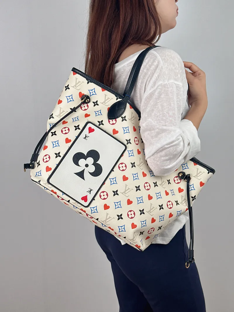 Louis Vuitton Shoulder Bag Neverfull White · Game On PVC Medium 31 × 14 × 28 cm — on-model view 1 of 2