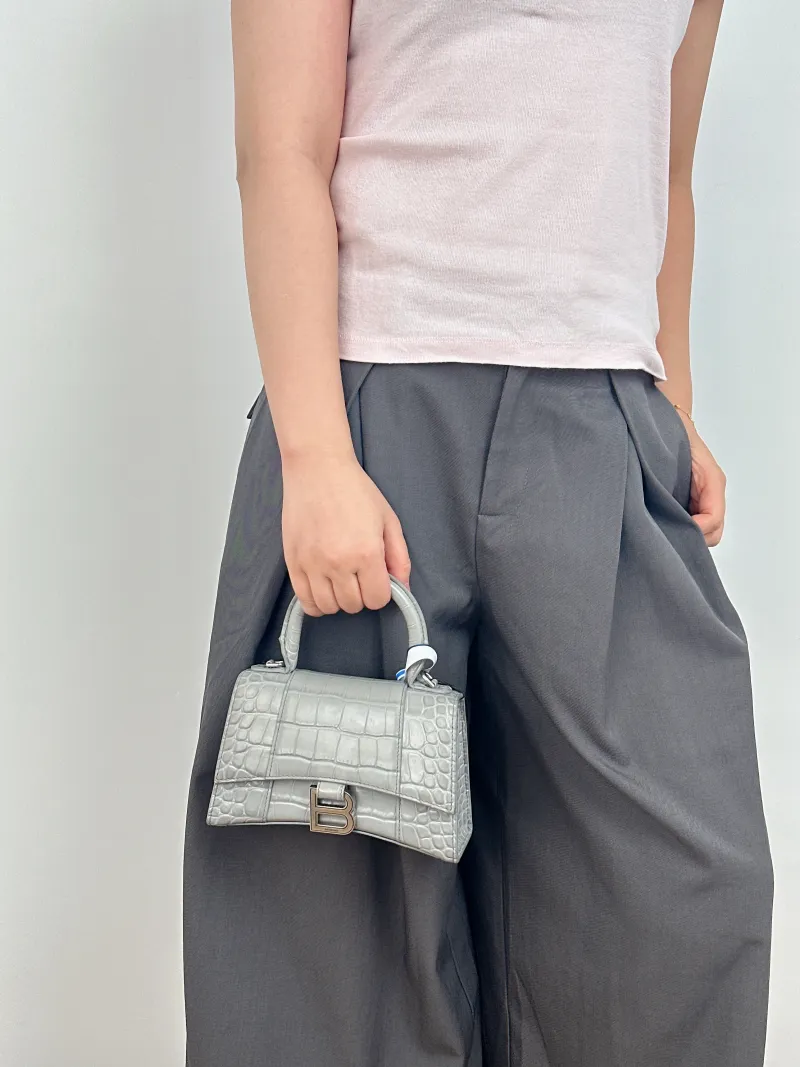 BALENCIAGA Crossbody Bag Hourglass Hourglass Bag Grey Calfskin Mini 19 × 6.5 × 12 cm — on-model view 2 of 2