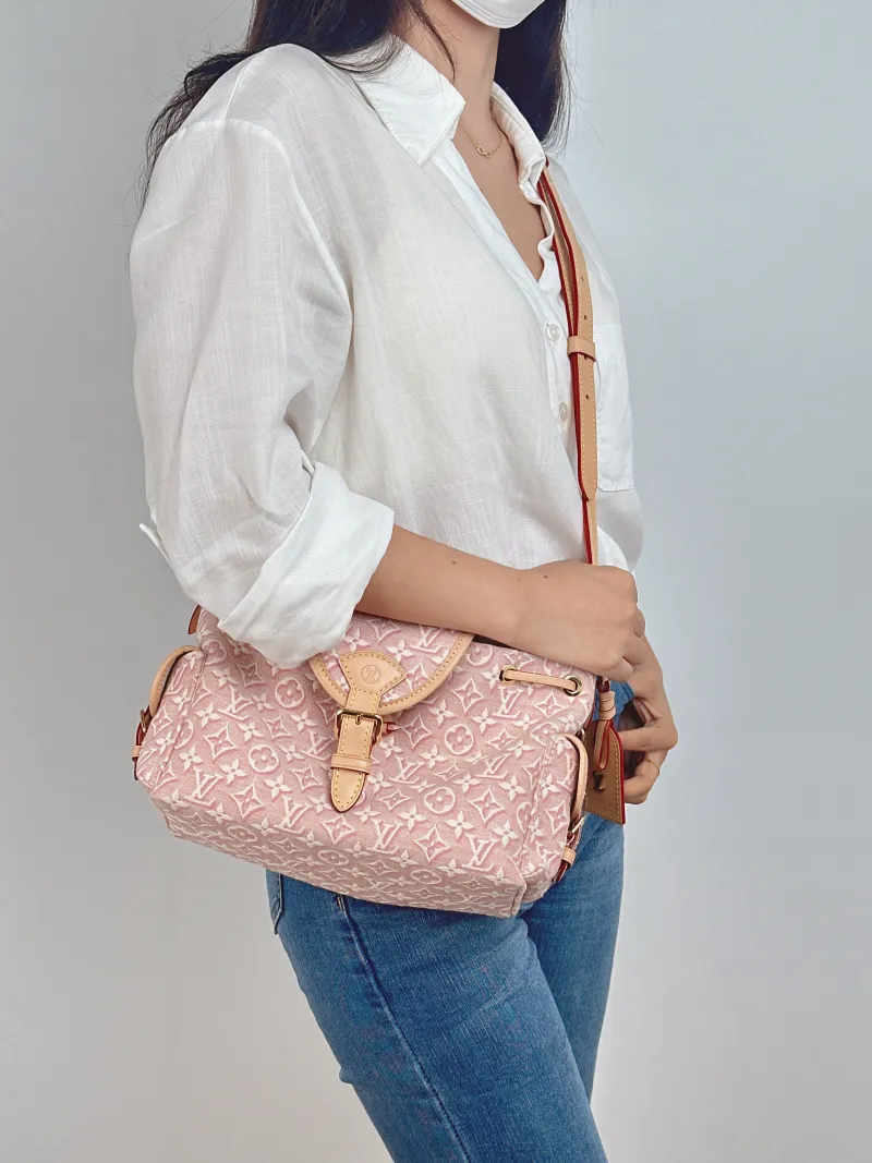Louis Vuitton Shoulder Bag ODYSSÉE Pink Canvas Small 27 × 12 × 17 cm — on-model view 1 of 2