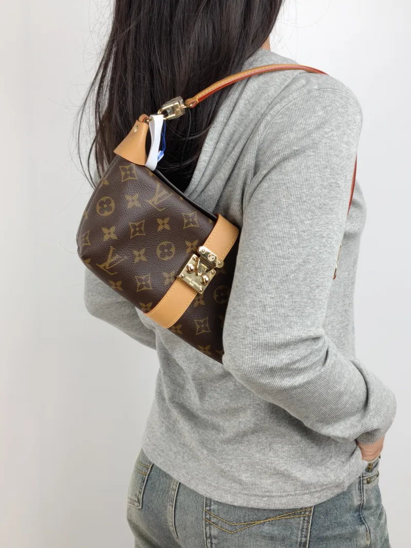 Louis Vuitton Shoulder Bag Pochette Mia Monogram PVC One Size 22 × 8 × 14.5 cm — on-model view 1 of 2