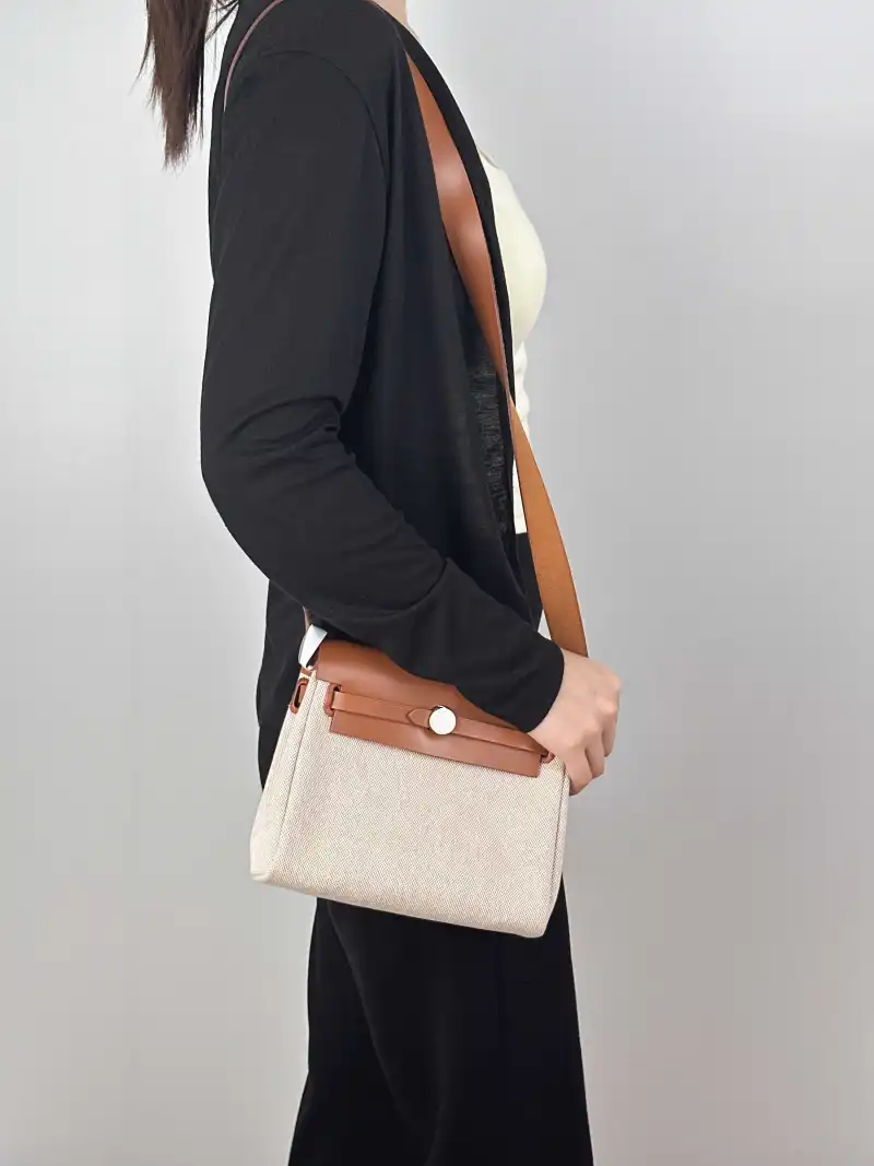 Hermès Shoulder Bag Herbag Zip 20 Beige Canvas mini20 × 7 × 17 cm — on-model view 2 of 2