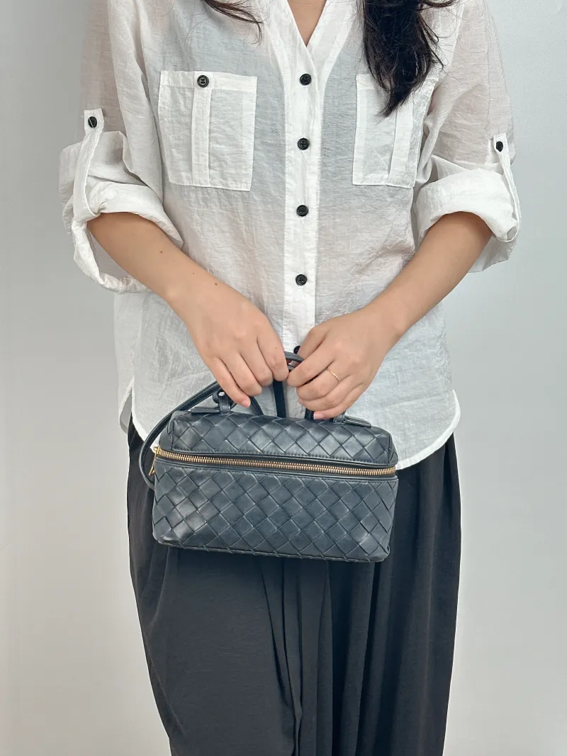 Bottega Veneta Top Handle Bag Woven Top Handle Bag Black Calfskin One Size 23 × 5.5 × 13 cm — on-model view 2 of 2