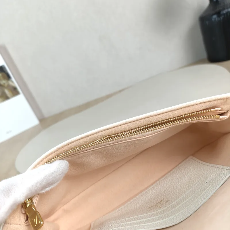 Louis Vuitton Crossbody Bag IVY White · Pink Empreinte Embossed Calfskin Small 23.5 × 4.3 × 12 cm — detail view 2 of 12