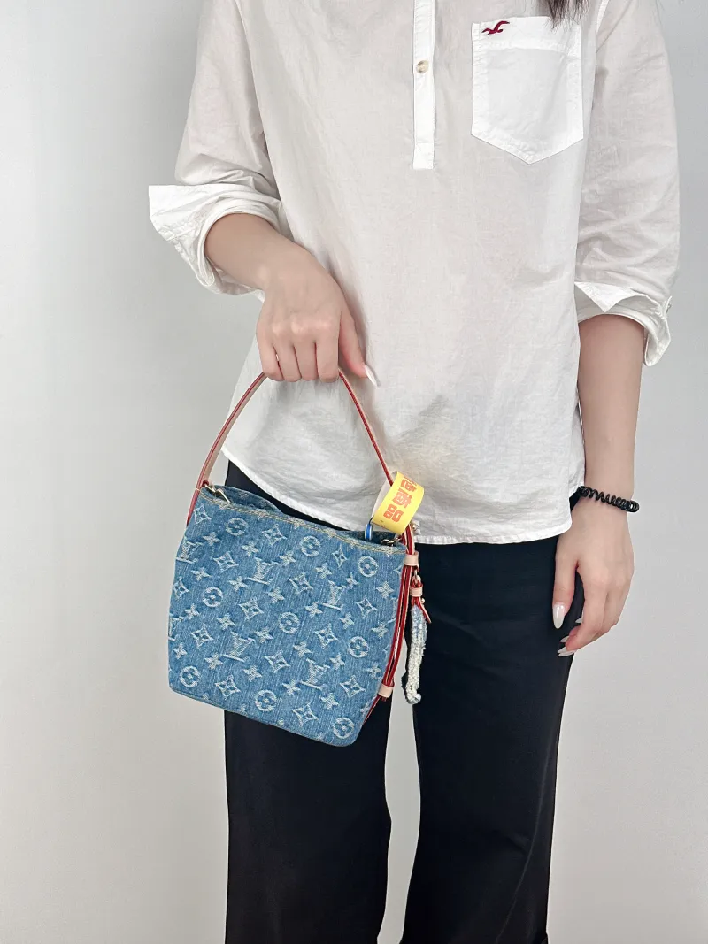 Louis Vuitton Top Handle Bag ALL IN BB Blue BB16 × 12 × 18 cm — on-model view 1 of 2