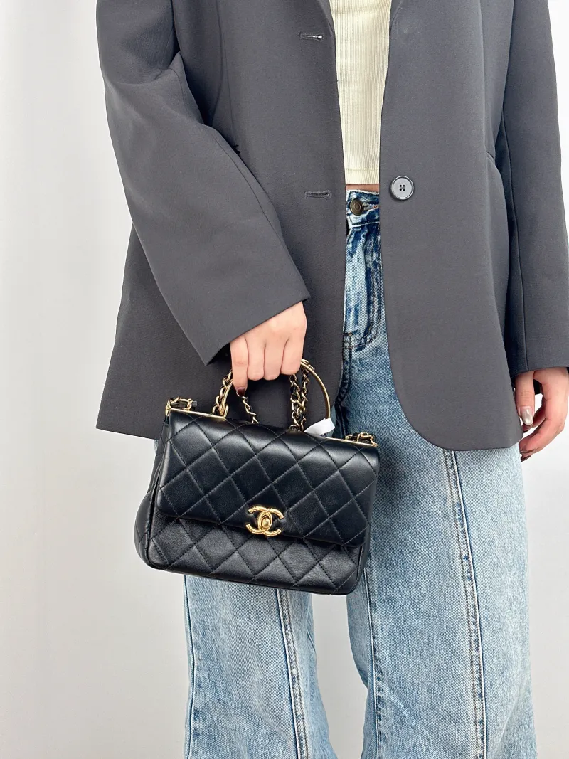 Chanel Crossbody Bag 24c mini Black Lambskin One Size 20.5 × 6 × 14 cm — on-model view 1 of 3