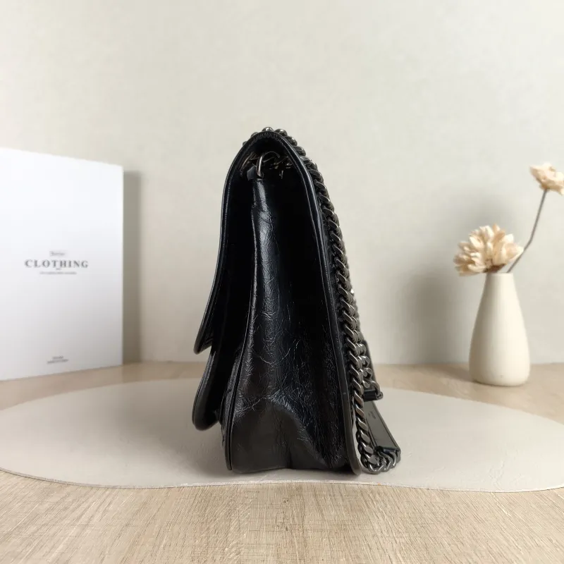 SAINT LAURENT Crossbody Bag Niki D Waxed Leather Calfskin Medium 28 × 8.5 × 20 cm — detail view 1 of 14