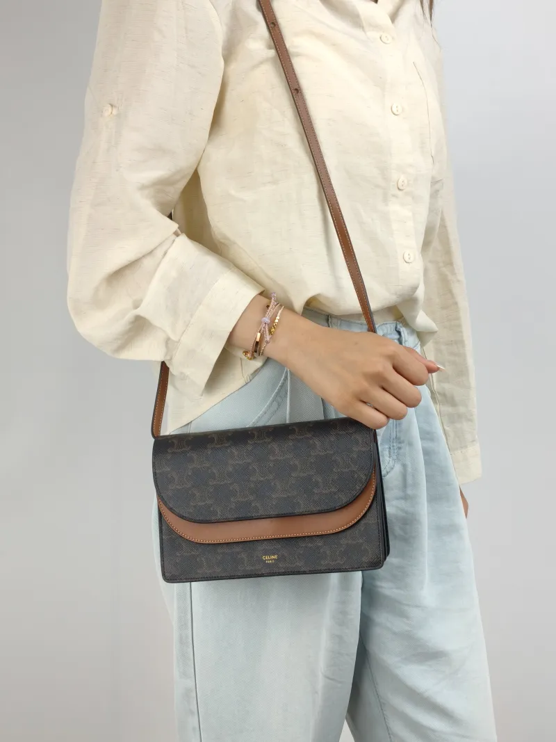 CELINE Crossbody Bag TRIOMPHE Clutchwoc Monogram PVC 20 × 6 × 12 cm — on-model view 2 of 2