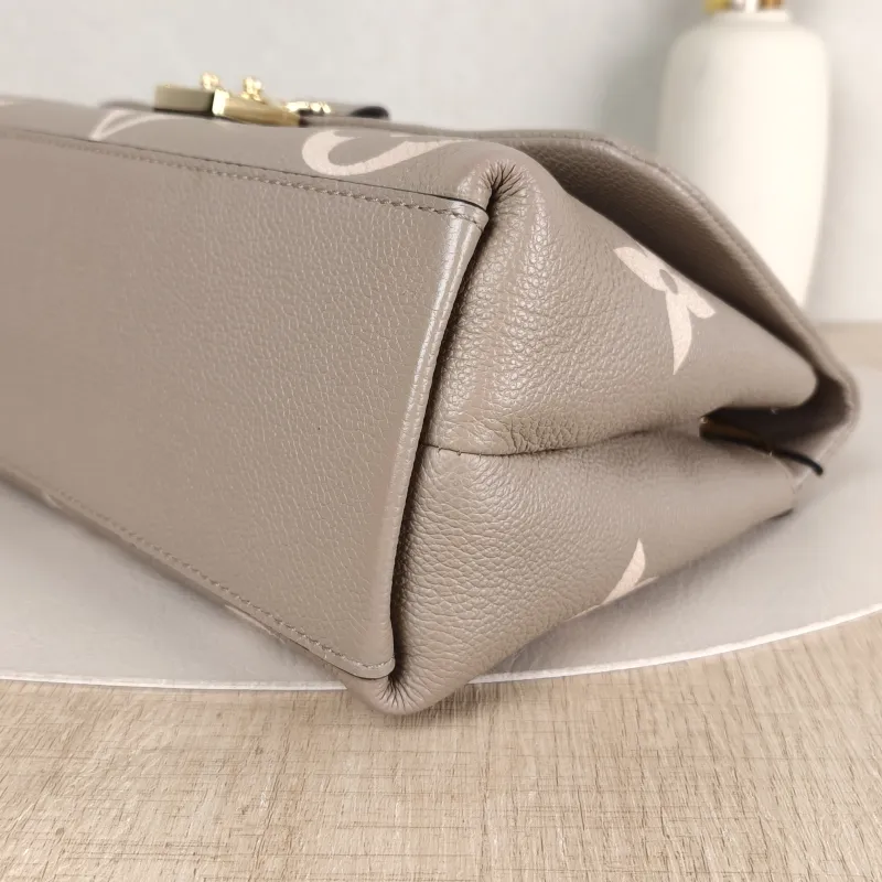 Louis Vuitton Crossbody Bag MADELEINE Empreinte Embossed Calfskin Medium30 × 11 × 19.5 cm — detail view 7 of 14