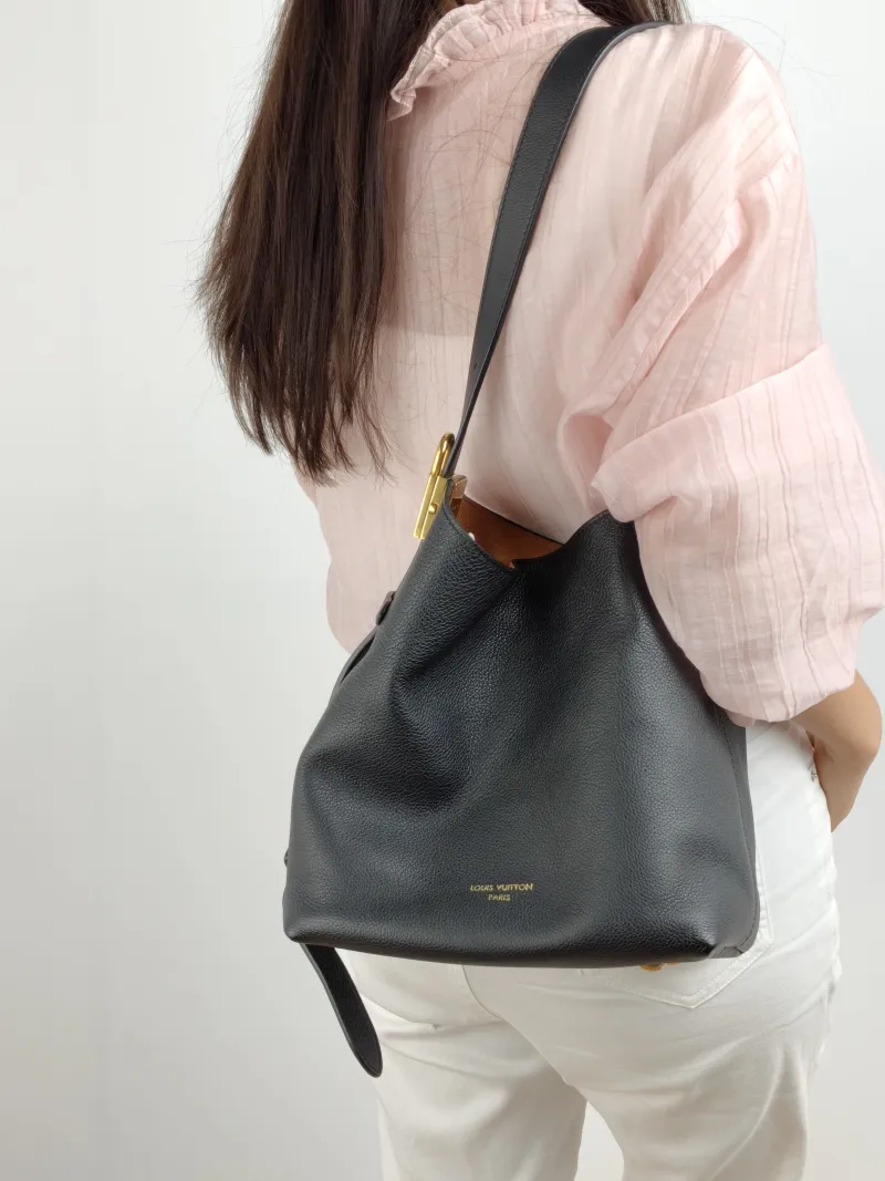 Louis Vuitton Shoulder Bag Low Key Hobo Shoulder Bag Black Calfskin Small 24 × 16 × 28 cm — on-model view 2 of 2