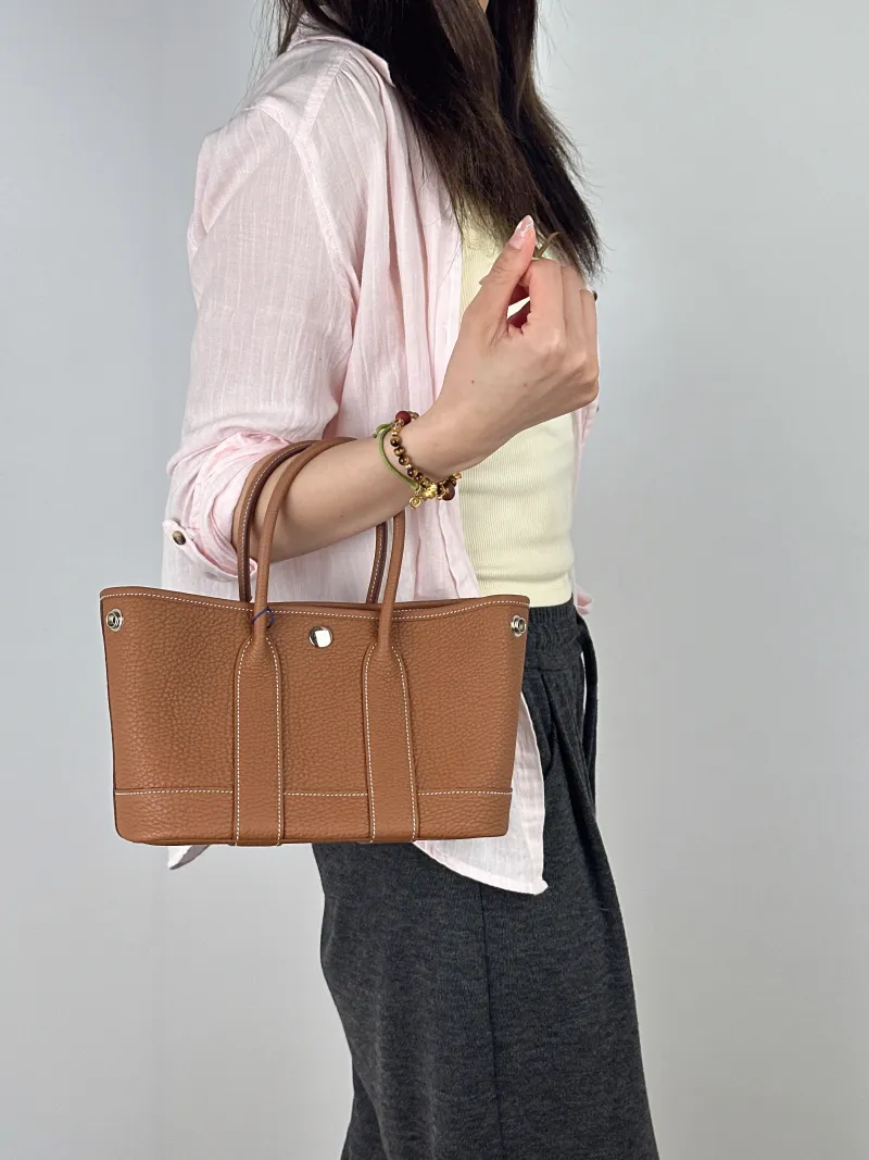 Hermès Top Handle Bag Neo Garden 23 Mini Negonda Calfskinmini23 × 10 × 16 cm — on-model view 2 of 2