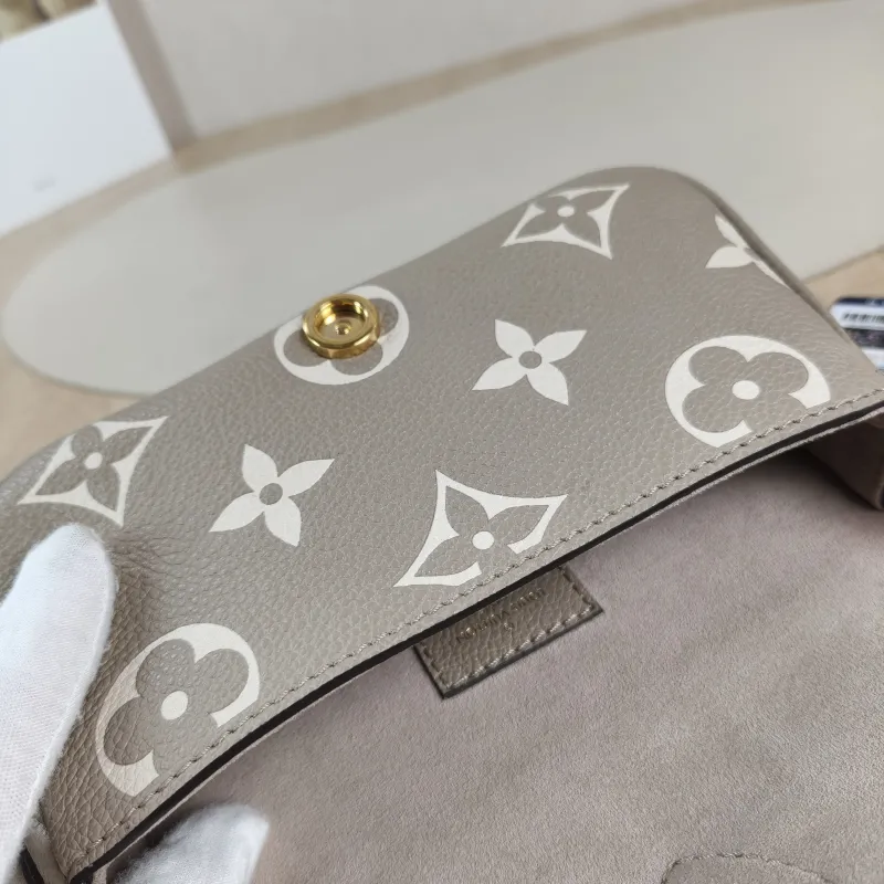 Louis Vuitton Crossbody Bag Diane Baguette Bag Empreinte Embossed Calfskin nano 19 × 6 × 10.5 cm — detail view 2 of 12