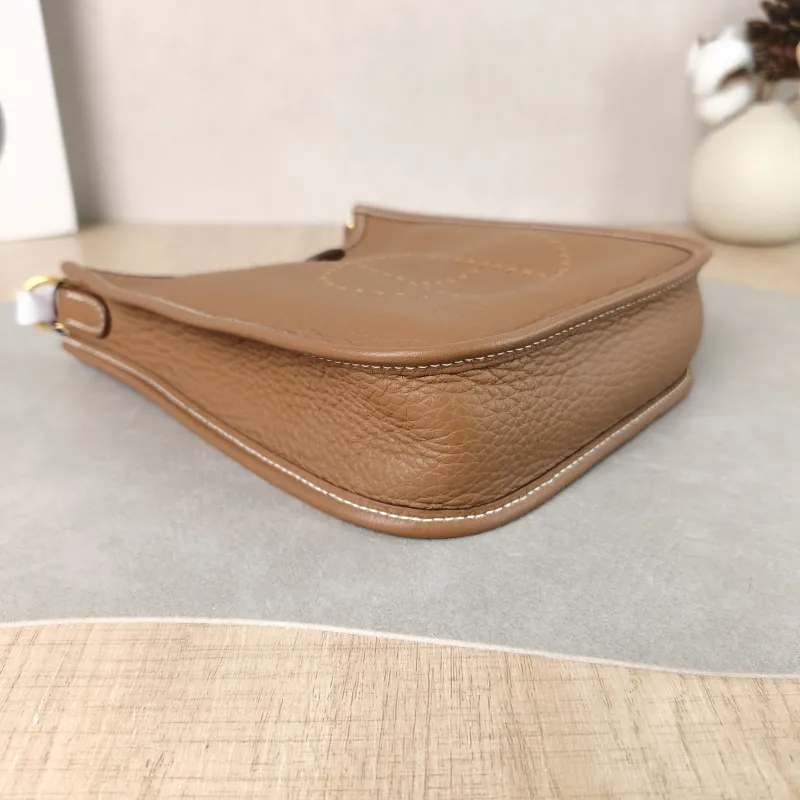 Hermès Crossbody Bag Evelyne Mini 16 Mini 16 Taurillon Clemence TC Calfskin Mini 17 × 5.5 × 18 cm W — detail view 1 of 11