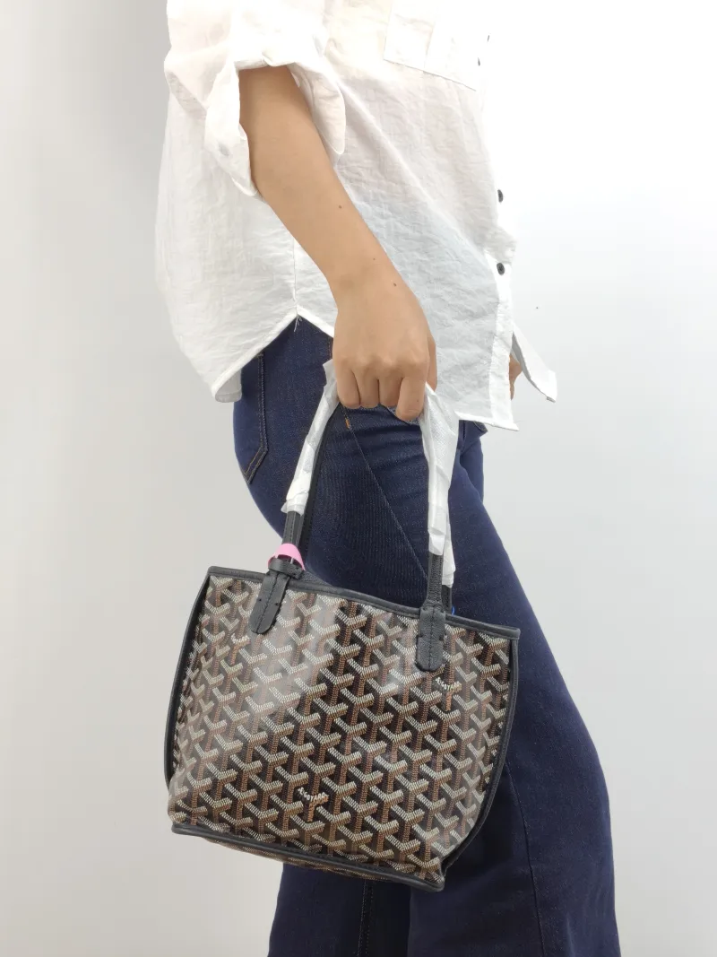 GOYARD Top Handle Bag ANJOU Shopping Tote Black ine Canvas Mini 19.5 × 9 × 19.5 cm — on-model view 2 of 2