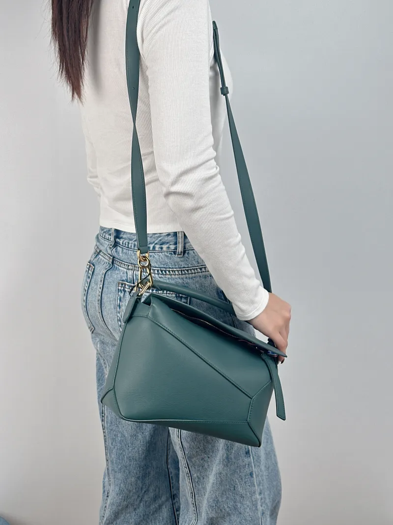LOEWE Crossbody Bag Puzzle Green CC alfskin Small 24 × 10.5 × 16.5 cm — on-model view 3 of 3
