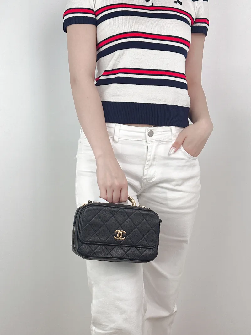 Chanel Crossbody Bag Camera Bag Black Grained Calfskin One Size20 × 7.5 × 12.5 cm — on-model view 1 of 3