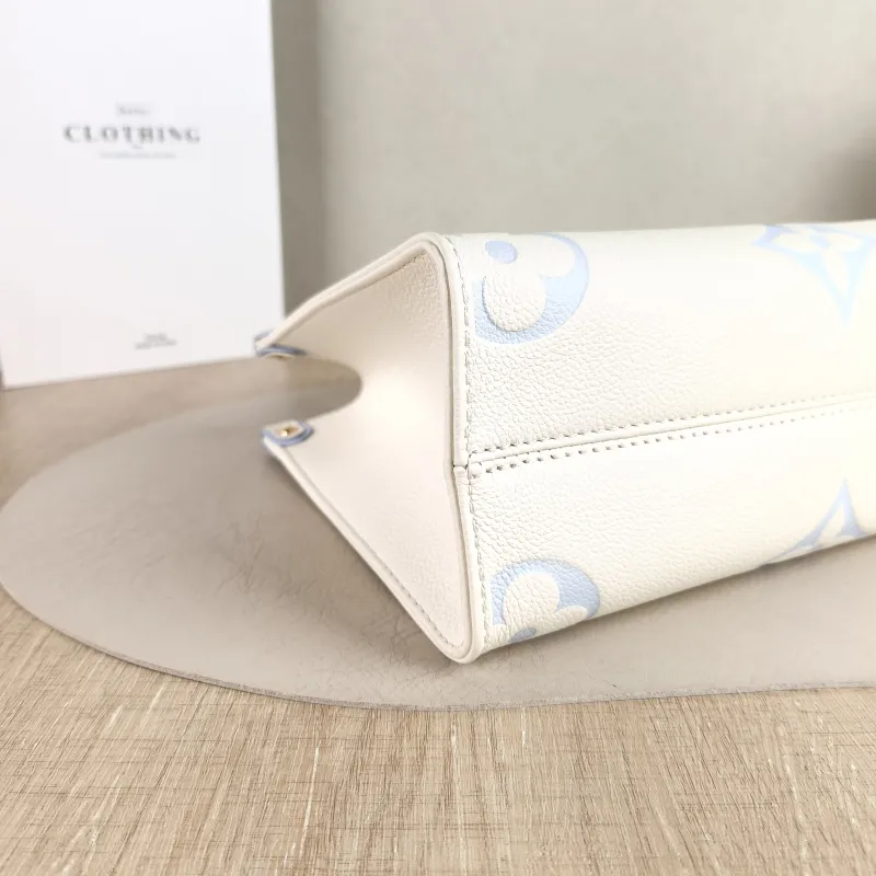 Louis Vuitton Shoulder Bag Onthego White · Blue Monogram Empreinte Embossed Calfskin Small 25 × 11.5 × 19 cm — detail view 9 of 11