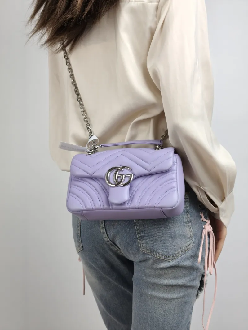 GUCCI Crossbody Bag GG Marmont Small Marmont 22 Lambskin Small 22 × 6 × 13 cm — on-model view 2 of 2