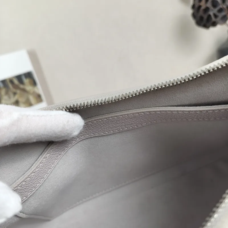 Louis Vuitton Crossbody Bag Boulogne Grey Empreinte Embossed Calfskin Small 26 × 9.5 × 16 cm — detail view 1 of 11