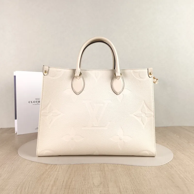 Louis Vuitton Shoulder Bag Onthego Medium White Monogram Empreinte Embossed Calfskin Medium 35 × 14 × 27 cm