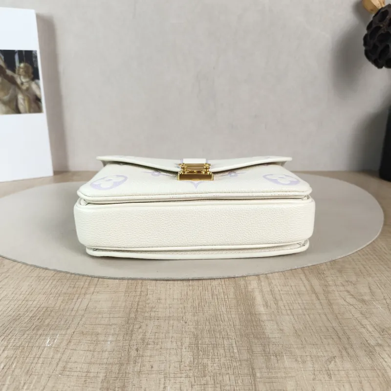 Louis Vuitton Crossbody Bag Pochette Métis East West White · Monogram Empreinte Embossed Calfskin Small 21.5 × 6 × 13.5 cm — cover view 3 of 5
