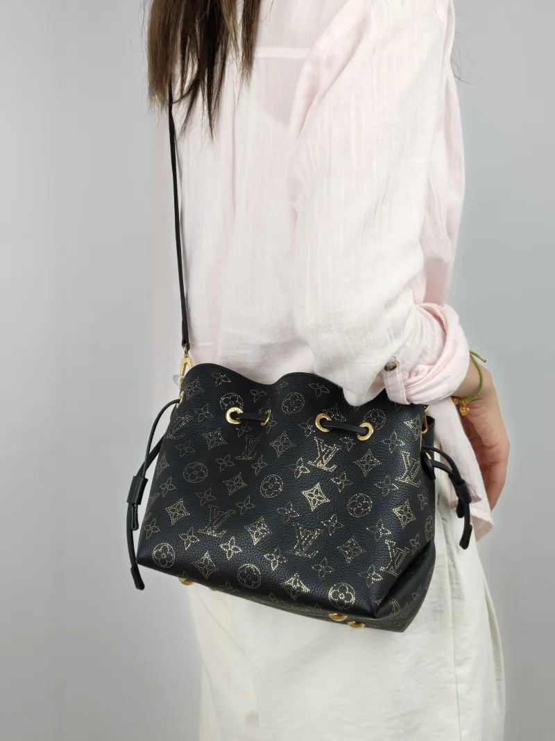 Louis Vuitton Crossbody Bag BELLA Black Calfskin One Size22 × 14 × 19 cm — on-model view 3 of 3