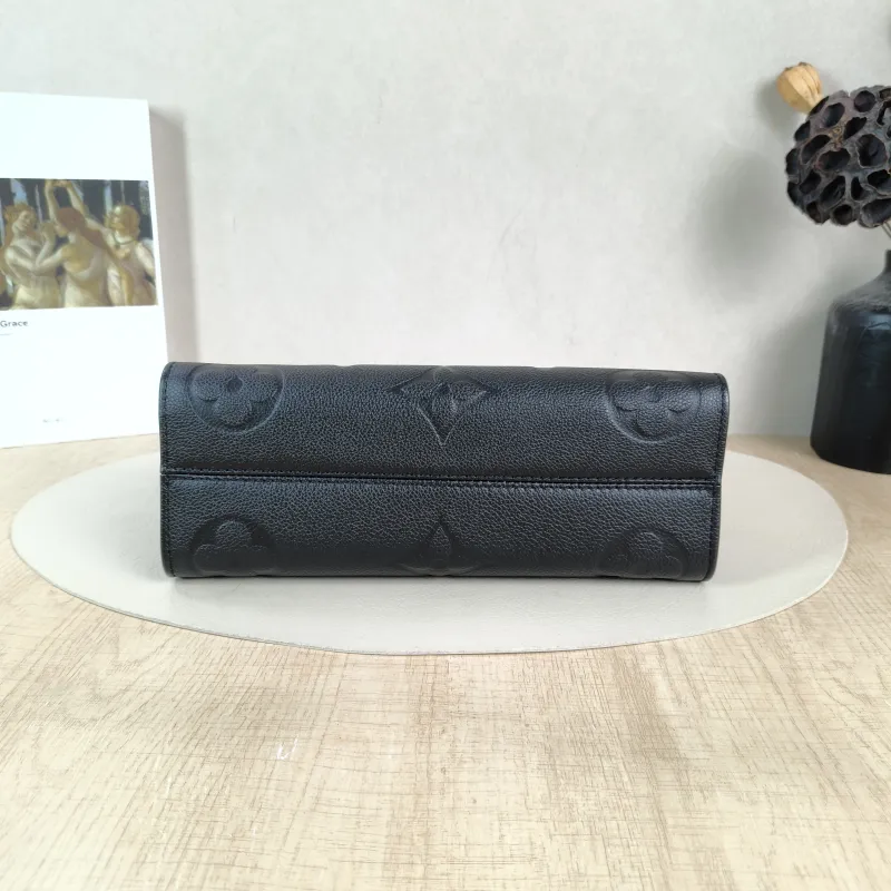 Louis Vuitton Crossbody Bag Onthego East West Two Straps Black Empreinte Embossed Calfskin Small 25 × 10 × 13 cm — cover view 2 of 6